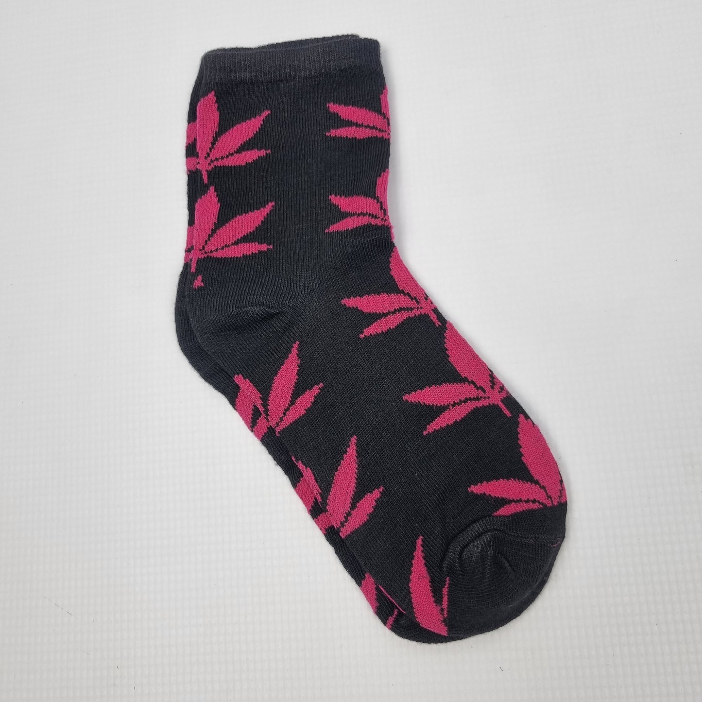 Black and pink cannabis leaf crew socks