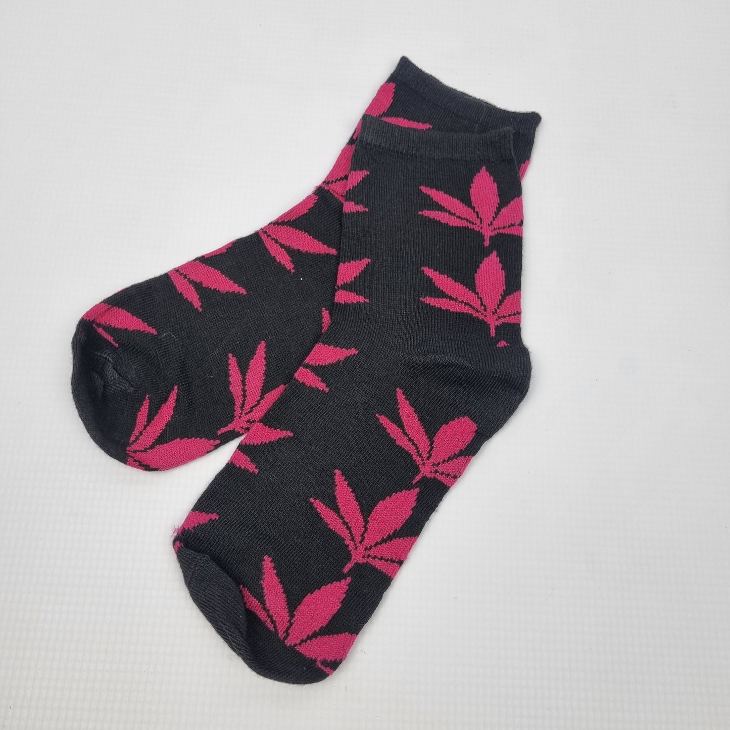 Black and pink cannabis leaf crew socks